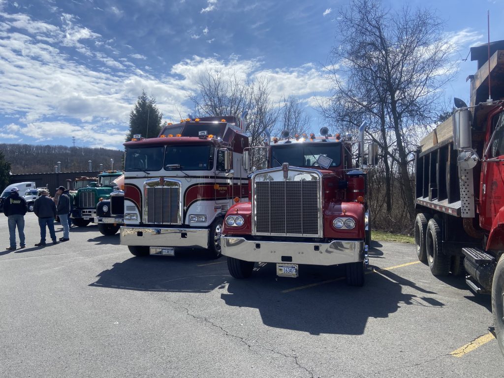 Two Kenworth Trucks at a Truck Show