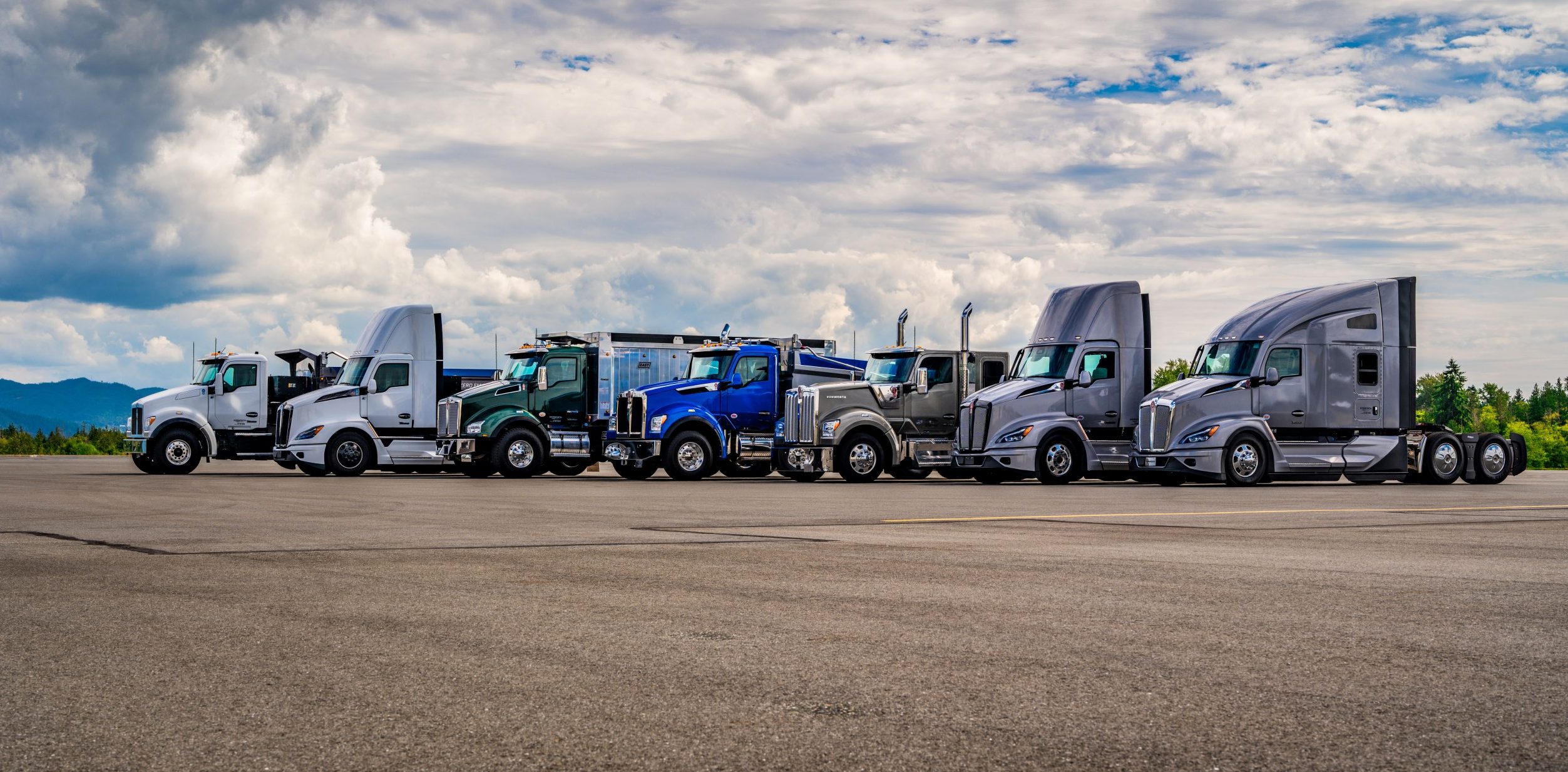 Multiple models of Kenworth Trucks lined up together
