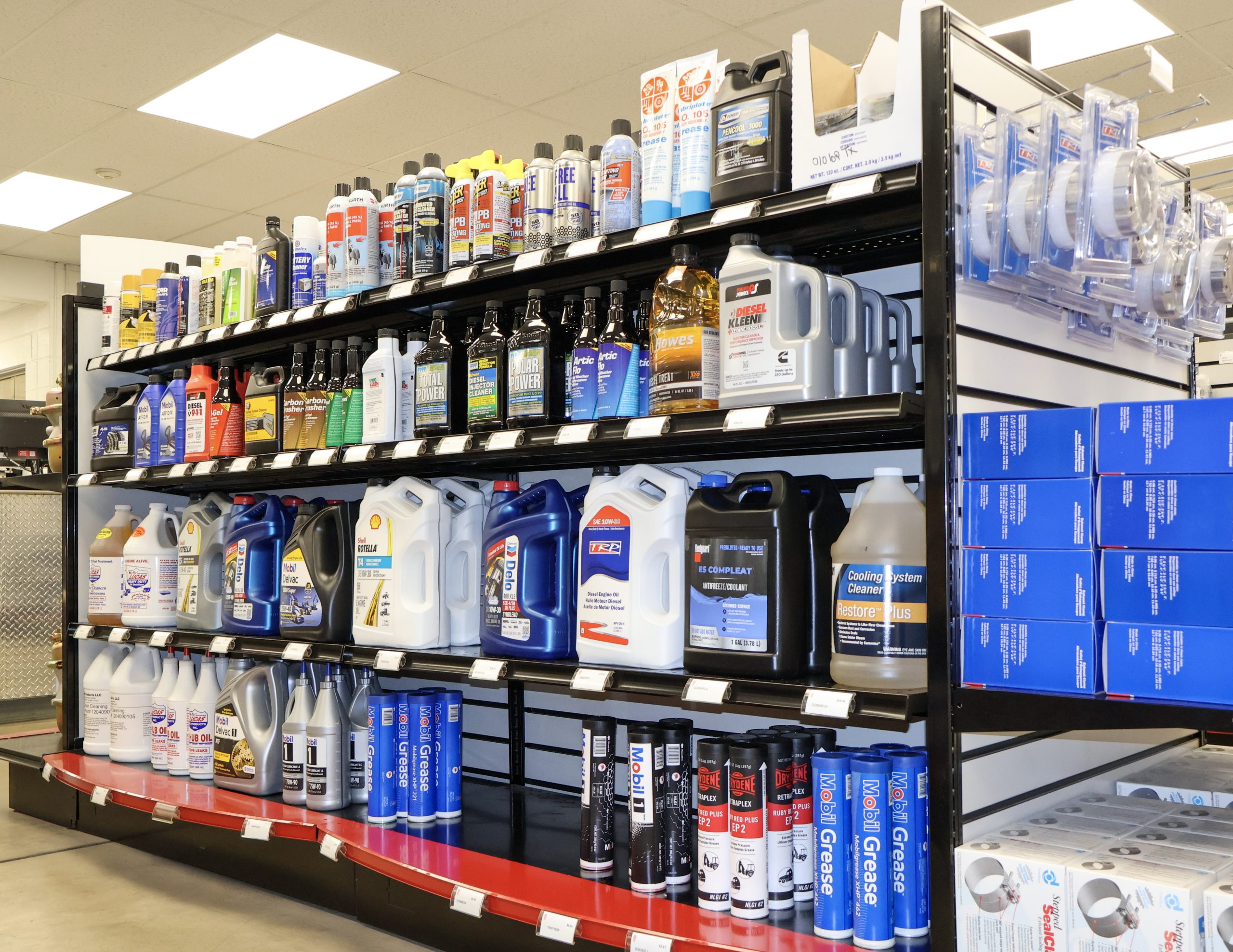 A shelf full of commercial truck chemicals